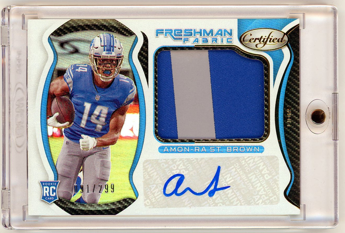 2021 Panini Certified Freshman Fabric Amon-Ra St. Brown #228 /299 Auto RC